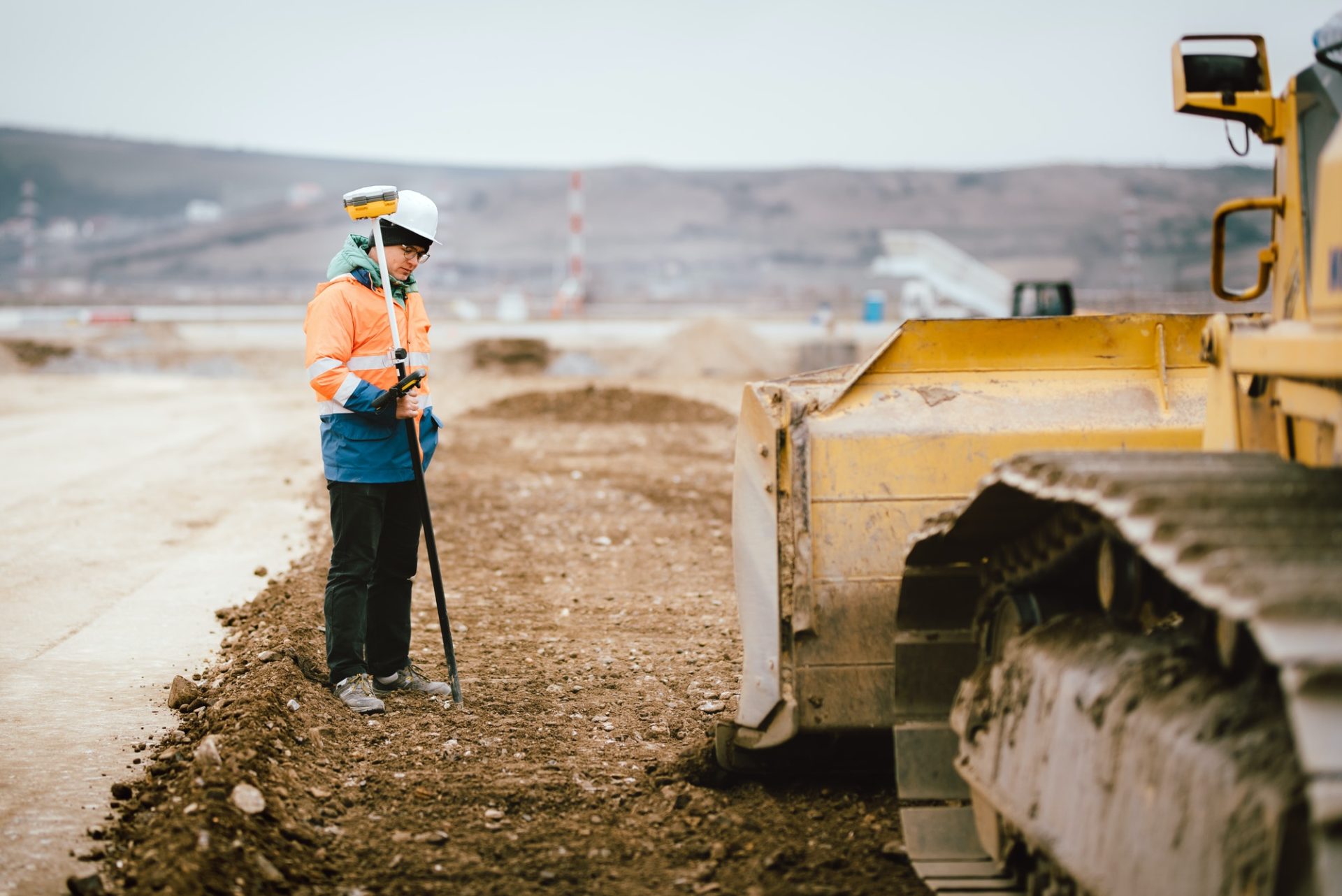 geodesy-details-construction-site-workers-building-highway-and-roads-surveying-engineer-details-e1648614330755