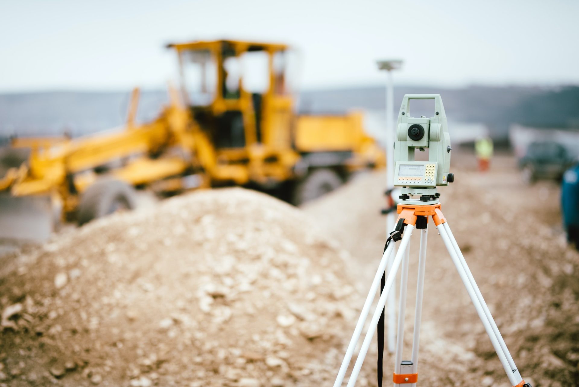 surveyor-equipment-gps-system-or-theodolite-outdoors-at-highway-construction-site--e1648614638795